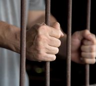 Hands of the prisoner in jail